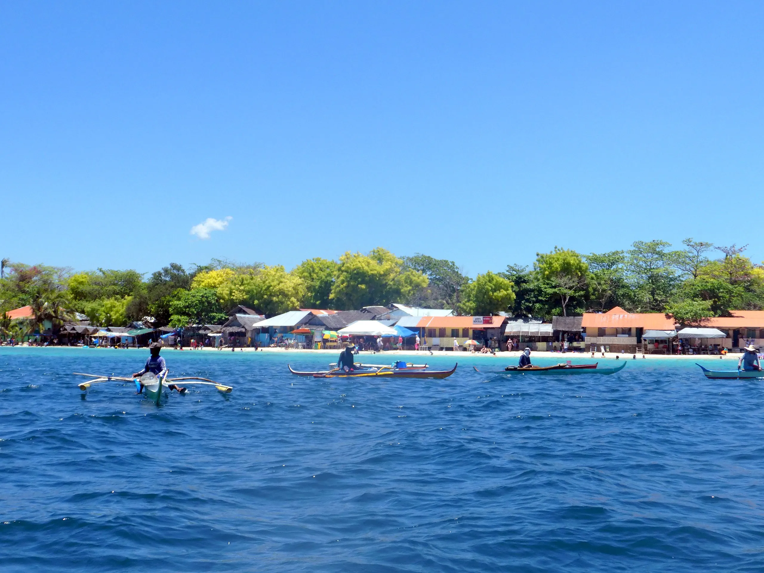 Traditional fishermen at sea in Moalboal