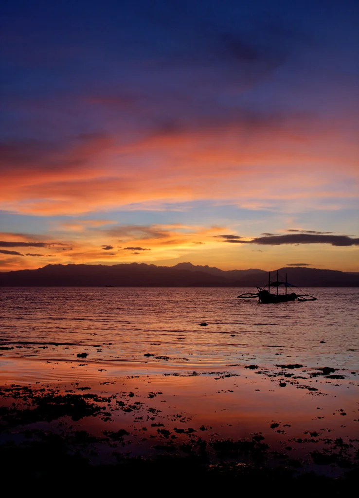 Beautiful sunset over Moalboal coastline