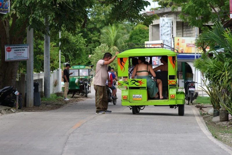 Tricycle heading to White Beach in Barangay Saavedra, Moalboal